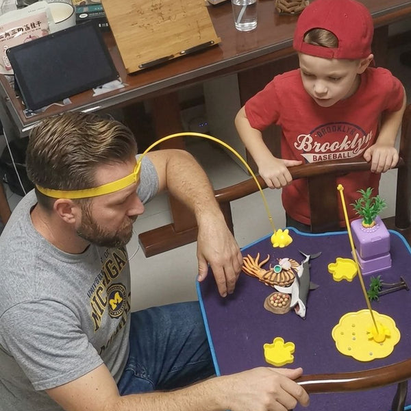Child using Magnetic 2-player Bee Headband Game