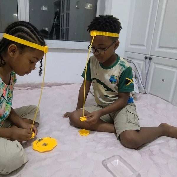 Child using Magnetic 2-player Bee Headband Game