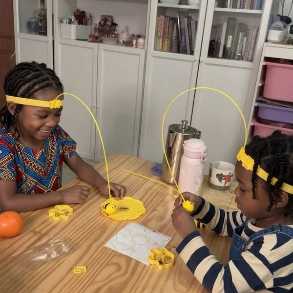 Child using Magnetic 2-player Bee Headband Game
