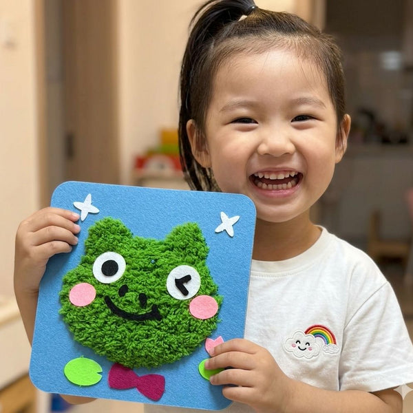 Child using DIY Fluffy Animal Art Kit — Pompom Yarn Craft for Kids