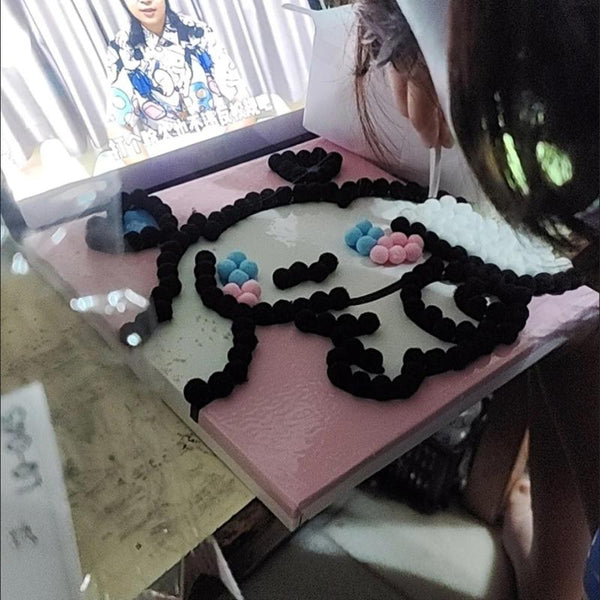 Child using Pompom Craft