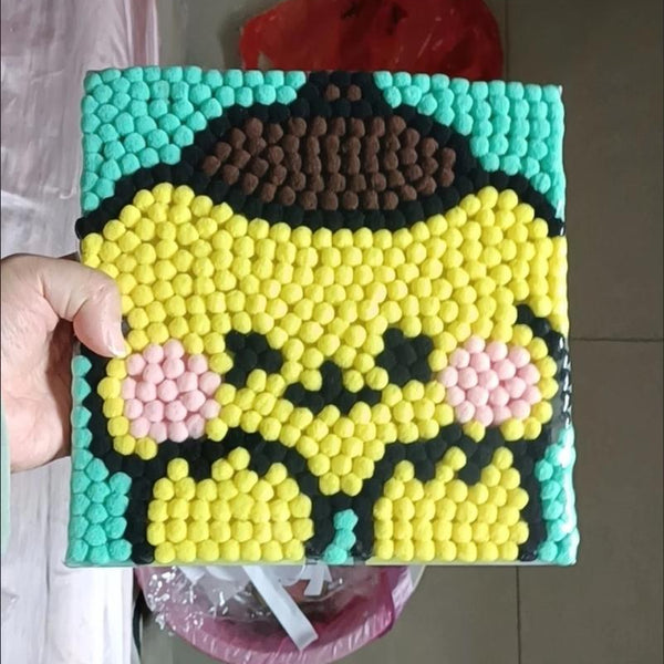 Child using Pompom Craft