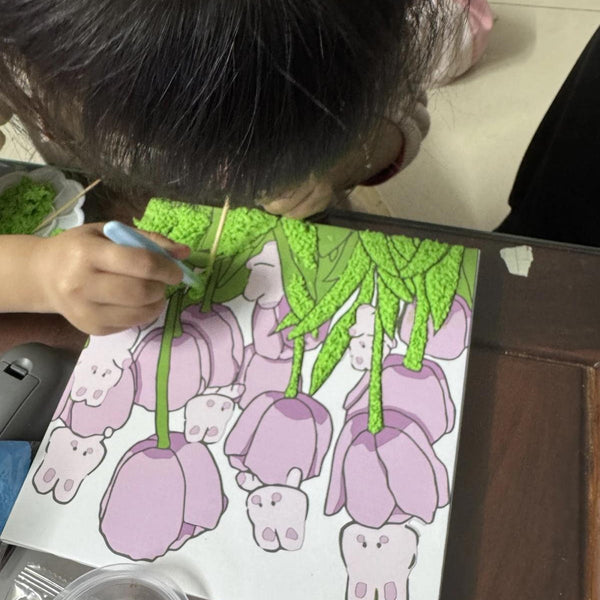Child using DIY Paper Pulp Painting Kit