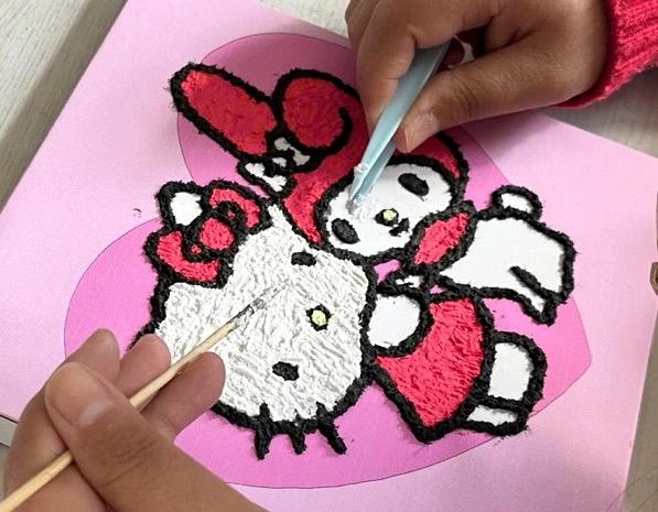 Child using DIY Paper Pulp Painting Kit
