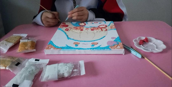 Child using DIY Paper Pulp Painting Kit
