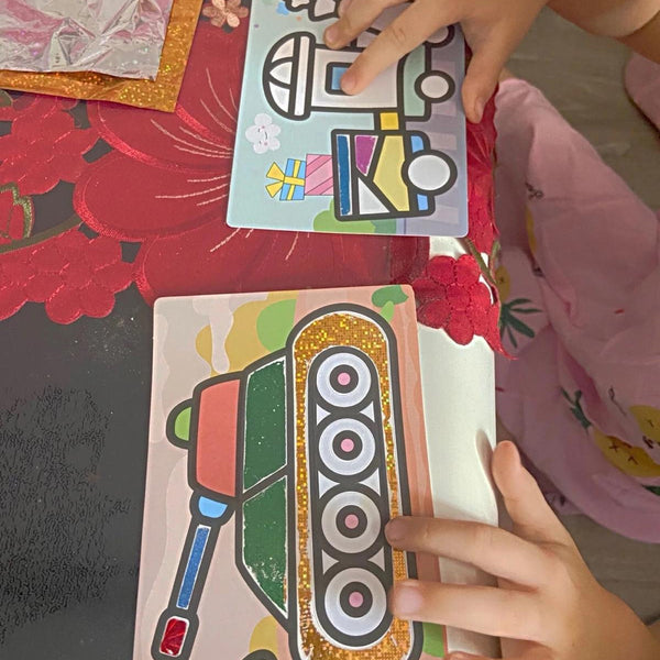 Child using Magic Art Transfer Painting