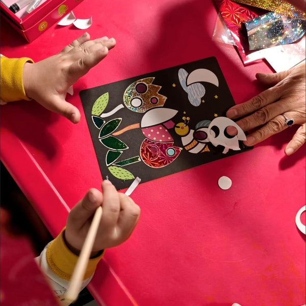 Child using Magic Art Transfer Painting