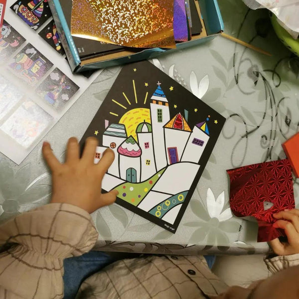 Child using Magic Art Transfer Painting