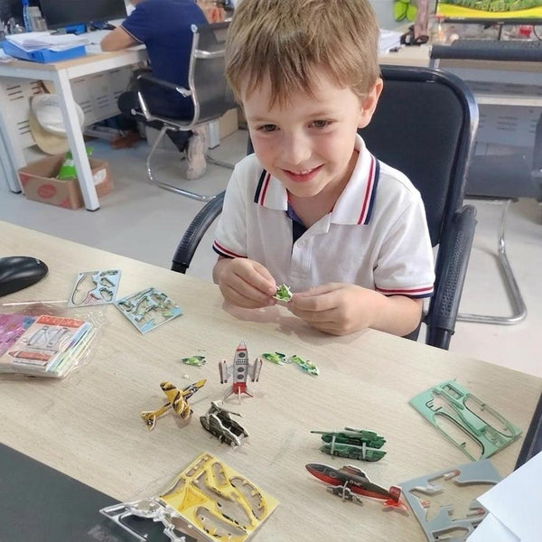 Child using 25/30PCS 3D DIY Paper Jigsaw Puzzles